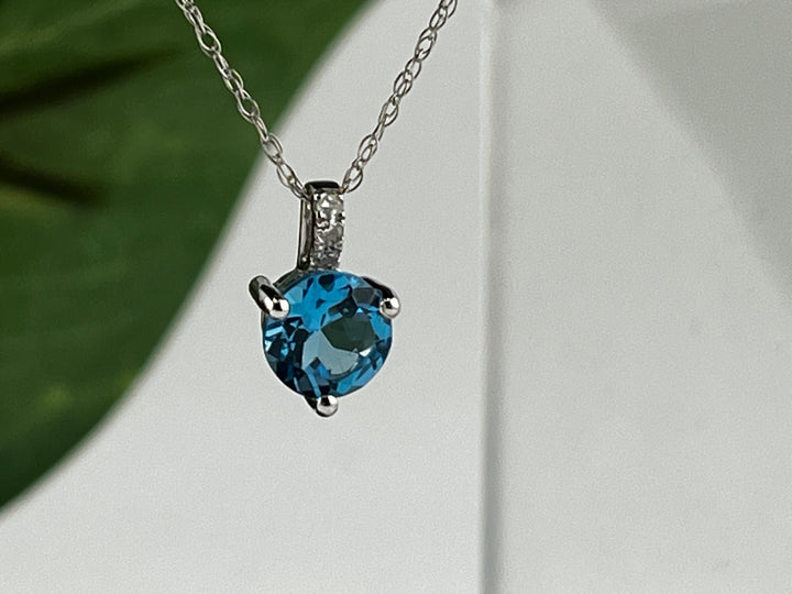 10K White Gold Blue Topaz and Diamond Necklace