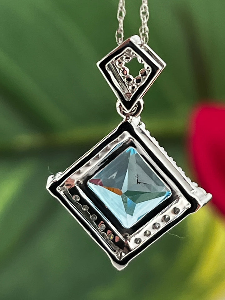 10K White Gold Blue Topaz and Diamond Necklace