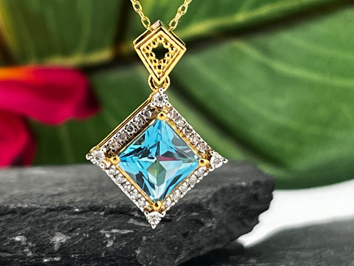10K Gold Blue Topaz and Diamond Necklace