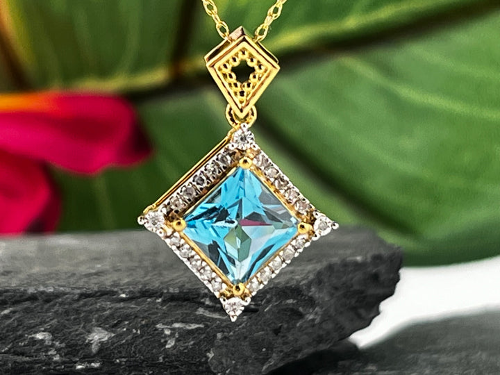 10K Gold Blue Topaz and Diamond Necklace