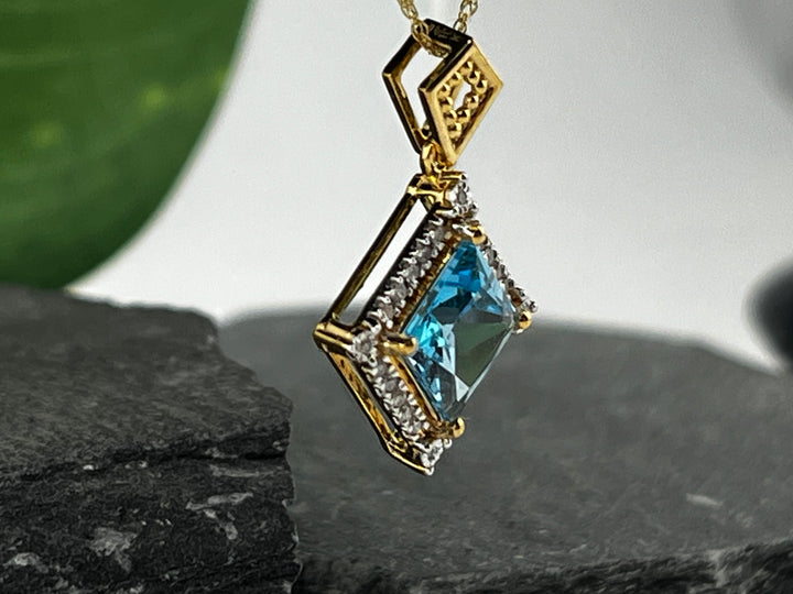 10K Gold Blue Topaz and Diamond Necklace