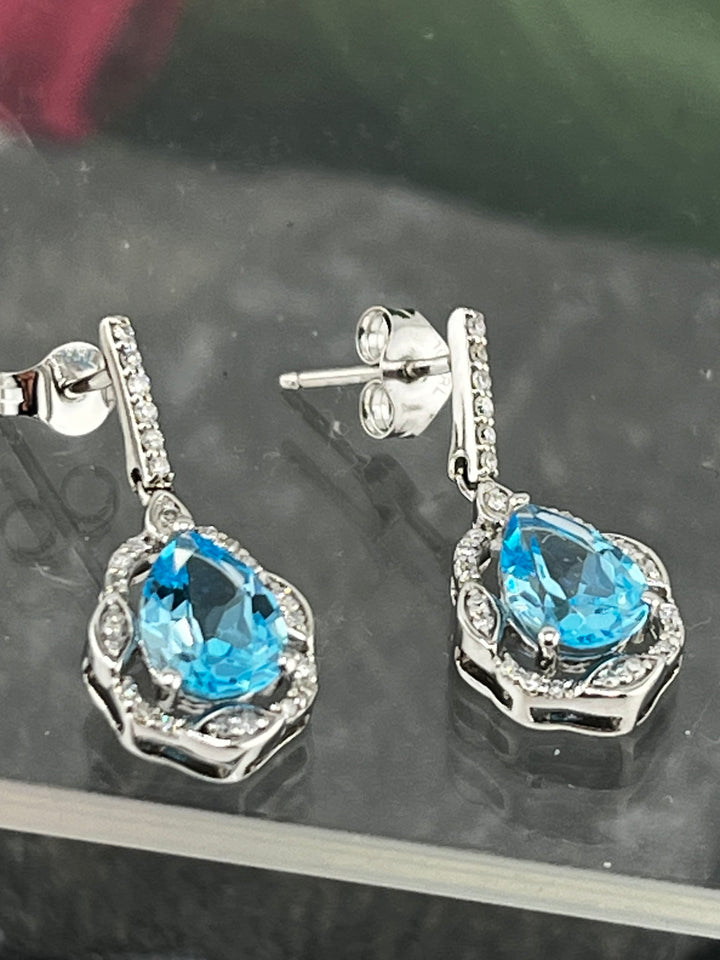 10K White Gold Blue Topaz and Diamond Earrings
