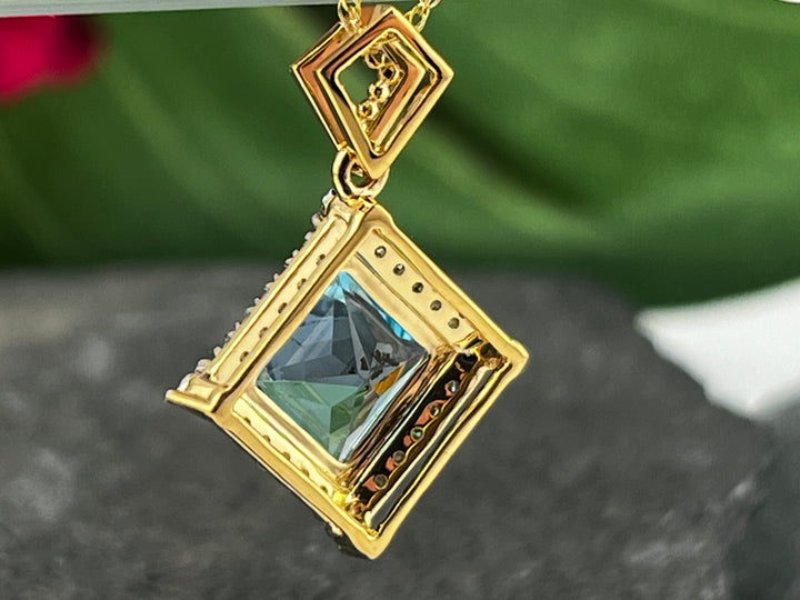 10K Gold Blue Topaz and Diamond Necklace