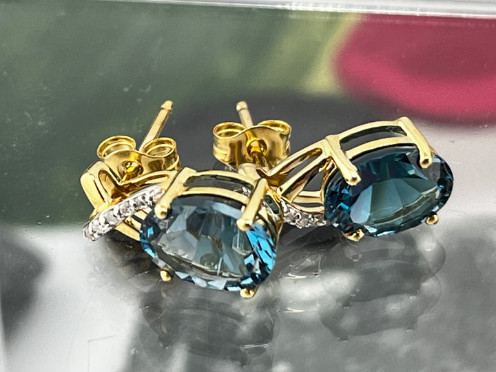 10K Gold London blue Topaz and Diamond Earrings