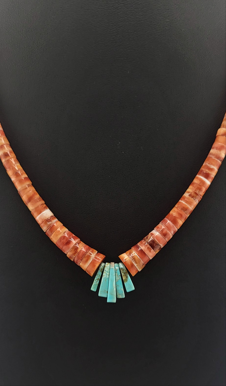 Orange Spiny Oyster, Turquoise graduated bead, and 925 Sterling Silver necklace.