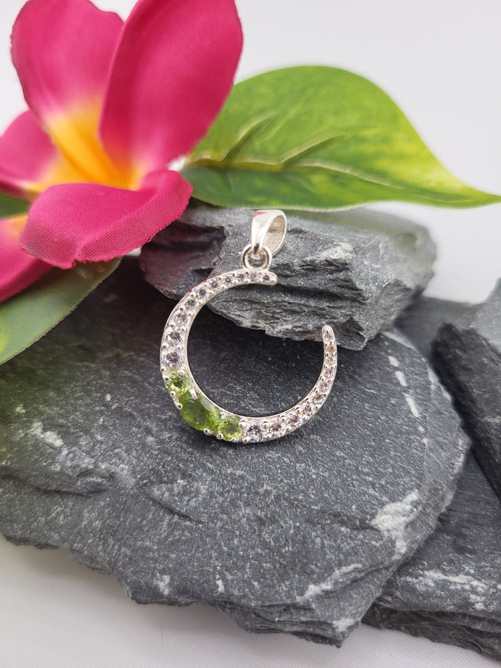 Dainty Peridot Crescent Moon Pendant