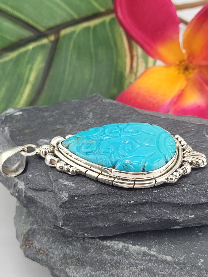 Carved Turquoise Pendant