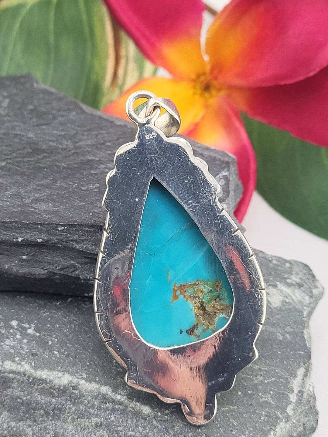 Carved Turquoise Pendant