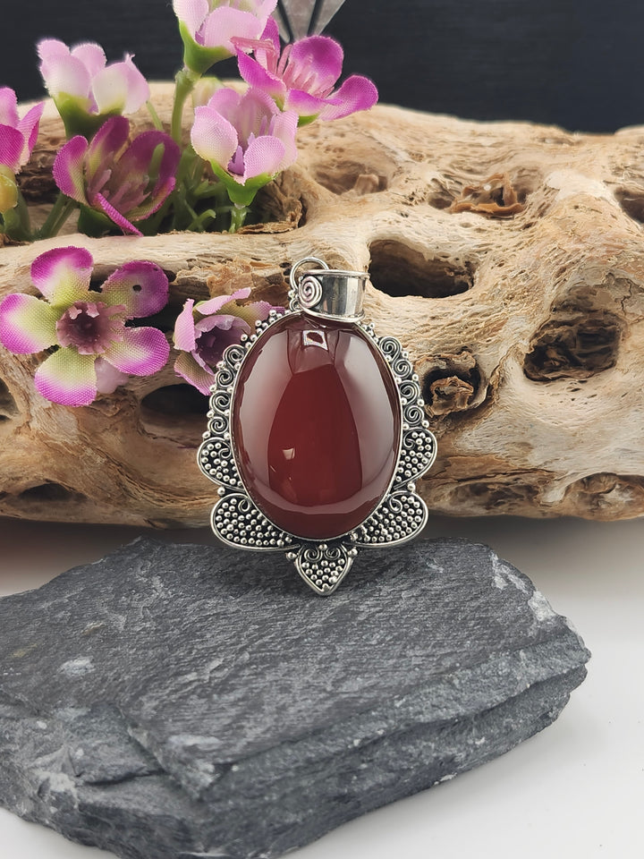 Carnelian Amber Pendant in sterling silver