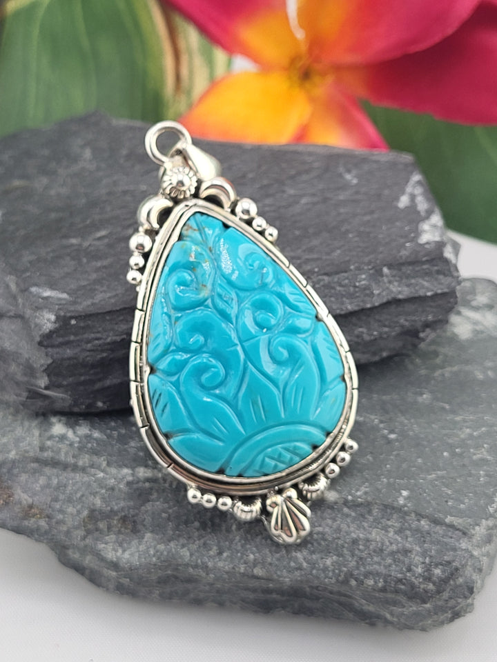 Carved Turquoise Pendant